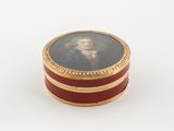 an image of a miniature box with a portrait of a man