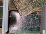 many different types of tile in a container