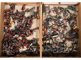 two boxes of assorted toy soldiers in them