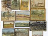 a lot of paintings hanging on the wall together