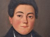 portrait of a man in a blue jacket and white shirt