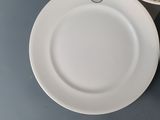 two plates that are sitting next to each other on a table