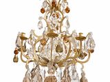 an image of a crystal chandelier hanging from a ceiling