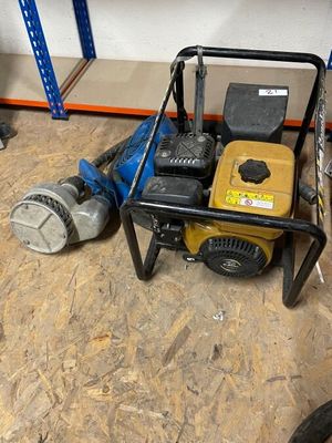 an image of a work station with tools on the floor