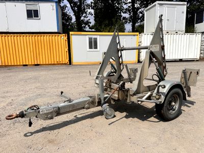 an image of a tow truck with a trailer attached to it