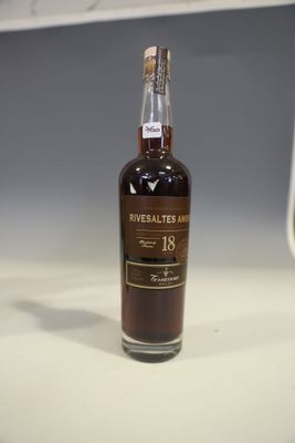 an image of a bottle of whisky sitting on top of a counter