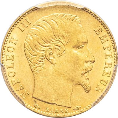 gros plan d'une pièce d'or avec un visage de femme