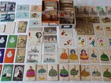 a lot of cards on the table with pictures on them