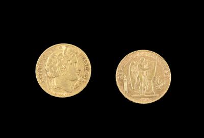 two pieces of gold coins on a black background
