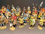 a lot of figurines that are on a table