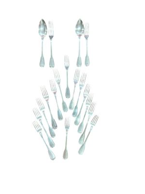 a lot of forks and spoons arranged in the shape of a heart