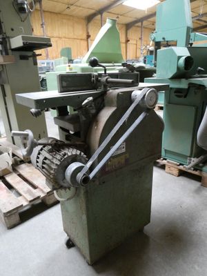 a machine that is sitting in a room with other machines