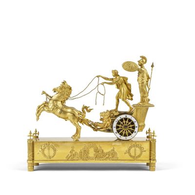 figurine en or représentant une calèche tirée par des chevaux, avec un homme à bord