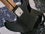 a guitar that is sitting on a stand in a room