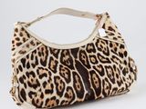 leopard print handbag with zipper closure and zip closure closure