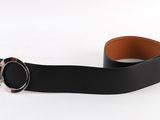 a close up of a black leather belt with a silver buckle