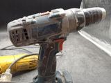 a drill that is sitting on top of a table