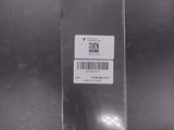 a plastic bag with a barcode on it sitting on a table