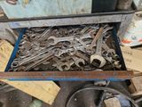 a box full of wrenches and other tools in it