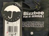 a label on the back of a jacket that says bizzlebee fun is serious