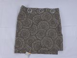 a black and white skirt with circles on it