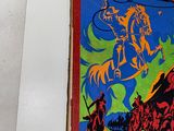 a book with a picture of a man riding a horse on it