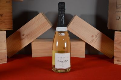 a bottle of wine that is sitting on a table