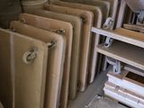 a room with a lot of old radiators in it