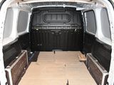 a white van that has some boxes in the back of it