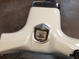 a close up of a motorcycle with a speedometer on the handlebar