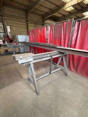 a lot of red curtains that are in a room