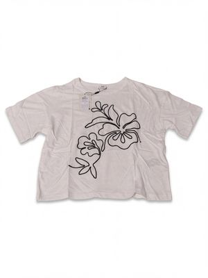 t-shirt blanc avec un motif floral noir sur la poitrine