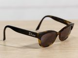 a close up of a pair of sunglasses on a table