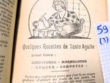 un livre ouvert sur lequel figure le dessin d'une femme dans une cuisine