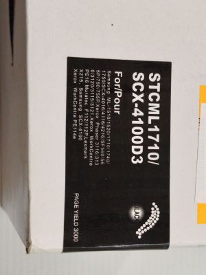 a white box with a black and yellow label on it