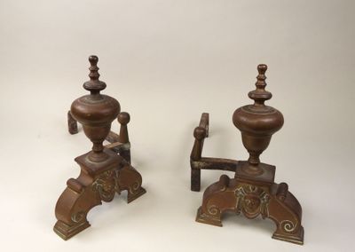 pair of antique cast iron candlesticks with carved wood bases