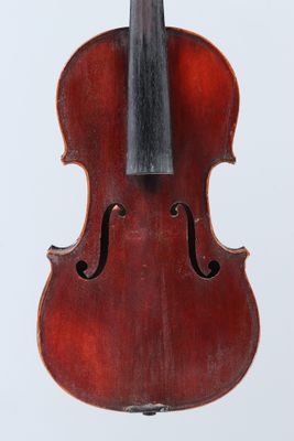 an old violin with a bow on a white background