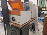 a machine that is sitting on a table in a room