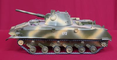 an image of a model of a tank on a pink background