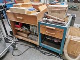 many boxes on a cart in the garage