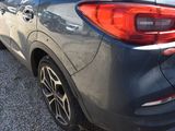 a car that is parked on the side of the road