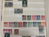 un livre avec beaucoup de timbres