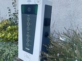 an image of a parking meter on the side of a building