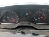 a close up of a car dashboard with various gauges