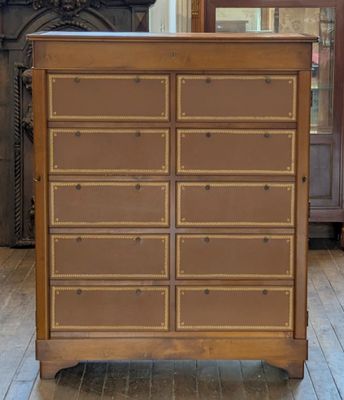 a dresser that has a lot of drawers on it