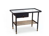 une photo d'une table d'appoint noire et dorée avec un plateau en verre