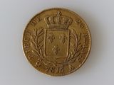 an image of a gold coin with a crown on top of it