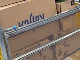 many boxes stacked on top of each other on a cart