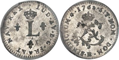 une pièce d'argent portant la lettre « l »