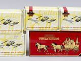trois paquets de cigarettes sur lesquels figure l'image d'une calèche